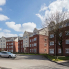 Отель Bluestone Apartments - Harvard, фото 1