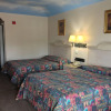Отель Camelot Inn & Suites Highway 290 NW Freeway, фото 2