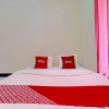 Отель OYO 93224 Fj Guest House, фото 15