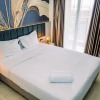 Отель Fancy And Nice Studio At Gold Coast Apartment, фото 2