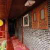 Отель Lijiang Manzhu City Love Inn, фото 5