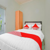 Отель OYO 90804 Oma Uti Homestay Syariah, фото 3