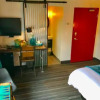 Отель Inn 15 Loft Suites, фото 2