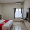 Отель RedDoorz Syariah near GOR Satria Area, фото 5