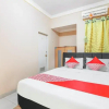 Отель Mulia Raja Kost by OYO Rooms, фото 13