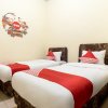Отель Nia Mandiri by OYO Rooms, фото 12