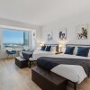 Отель Beachfront Double Queen Hotel CozySuite, фото 5