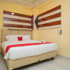 Отель RedDoorz Plus Syariah near Pasar Turi, фото 7