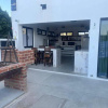 Отель Casa Arrecife, Beach is steps away! Fast internet, Private cozy room!, фото 1