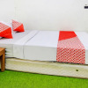 Отель OYO 90725 Zeevanna Guest House Syariah, фото 8