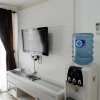 Отель Homey 1BR at The Wave near Epicentrum Kuningan, фото 7