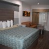 Отель Grand Villa Inn & Suites - Humble в Хамбле