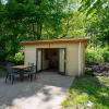Отель Practical chalet with terrace, in a green holiday park near Amsterdam, фото 1