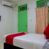 Отель Oyo 502 Wisma Bukti, фото 6