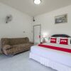 Отель OYO 1165 UMA Apartment, фото 20