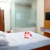 Отель Nida Rooms Pasar Buah Medan Tuntungan, фото 12