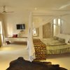 Отель The Villa Luxury Suites Hotel на пляже Diani Beach