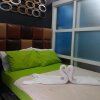 Отель Netflix and Unli WIFI!!! The Elchies Room at Tagaytay Prime Residence, фото 12