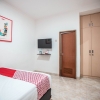 Отель OYO 868 Wisma Berkat, фото 12