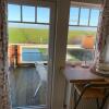 Отель Unser Haus am Deich - Wohnung Meerblick, фото 1