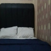Отель OYO 90706 Kost Alam Jaya Syariah, фото 3