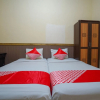 Отель Triantama Kost Syariah by OYO Rooms, фото 14