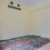 Отель RedDoorz Syariah near Kebun Raya Liwa, фото 11