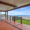 Отель Palm Beach Absolute Beach Front Holiday Home, фото 10