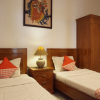 Отель OYO 244 Griya Cemara Homestay, фото 3