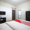 Отель Wisma Ray Syariah by OYO Rooms, фото 7