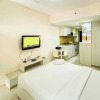Отель Fancy And Nice Studio At Tamansari Sudirman Apartment, фото 4