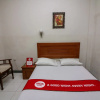 Отель OYO 717 Hotel Dharma Utama Syariah, фото 22
