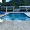 Отель Seamist villa @Oceanpointe Lucea comfy 2BR w/pool gym & parking, фото 13