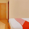 Отель OYO 92924 Kalista Guest House Syariah, фото 16