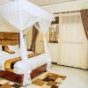 Отель Beautiful 2-bedroom Apartment in Entebbe, фото 2