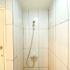 Отель Minimalist And Strategic Studio Apartment At Grand Kamala Lagoon, фото 19