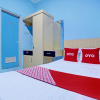 Отель OYO 93209 Guest House Cemara 3, фото 13