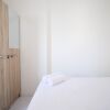 Отель Cozy Living And Tidy 2Br At Puncak Dharmahusada Apartment, фото 14