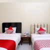 Отель OYO 1366 Kayoman Family Homestay, фото 17