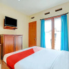 Отель OYO 90302 Wisma Damai, фото 6