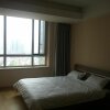 Отель Dalian Yashige Hotel Apartment, фото 3