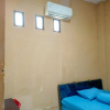 Отель OYO 93073 Penginapan 69, фото 11
