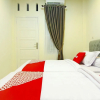 Отель OYO 90978 Khalifi Guesthouse Syariah, фото 11