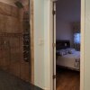 Отель Trinity Escapes - Two Bedroom two bathroom full Apartment near airport, фото 13