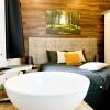 Отель Modern chalet with spa and sauna, in a holiday park on the Veluwe, фото 6