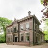 Отель Commodious Mansion in De Schiphorst With Garden, фото 1