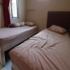 Отель OYO 90145 Furqon Guest House Syariah, фото 3