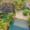 Отель Jinghong Nabu Homestay (Yi Nationality Garden), фото 1