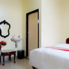 Отель OYO 1126 Trio R Kost Syariah, фото 6