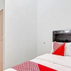 Отель OYO 92946 Dekna Homestay Syariah, фото 1